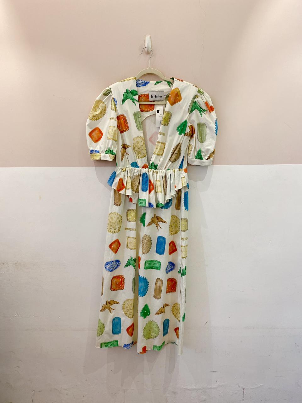 Vestido midi estampado peplum Lo De Loui PP